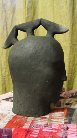 Глиняная голова